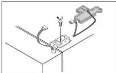 Technical diagram showing a mechanical assembly with wires and components (no text or symbols)