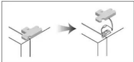 Diagram showing a mechanical assembly or assembly process with two views and a curved arrow indicating motion (no text or symbols present)