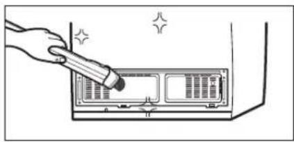 Illustration of a hand using a pen to press internal components (no text or symbols visible)