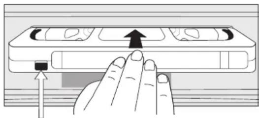 Illustration of a hand pressing down on a device panel with an arrow indicating motion (no text or symbols present).