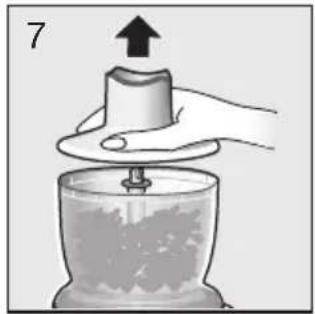 Illustration of a hand pressing a cylindrical object onto a baseplate, with an upward arrow indicating motion (no text or symbols).