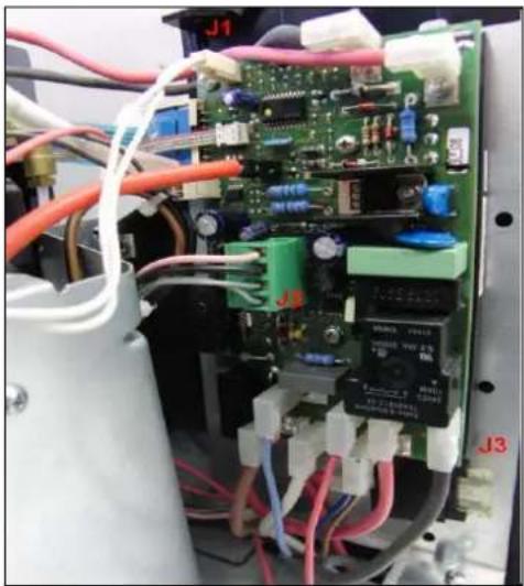 Close-up of an electronic circuit board with visible components and wiring (no readable text or symbols)