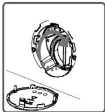 Technical illustration of a mechanical component with two views: top shows internal gear assembly, bottom shows circular housing (no text or symbols)