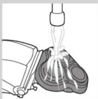 Illustration of a mechanical device emitting liquid from a piping bag (no text or symbols)