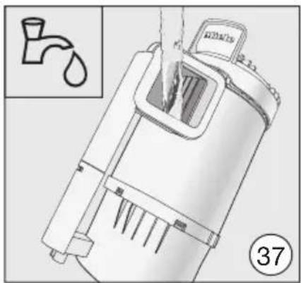 Technical diagram of a handwashing device with labeled parts and an inset showing a faucet symbol and water droplet.