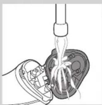 PHILIPS PowerTouch PT919 - A borotvaegység tisztítása csap alatt - 2