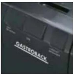 Close-up of a black USB cable connector attached to a black rectangular device (no visible text or symbols)