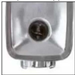 Close-up of a metallic mechanical component with a central circular feature (no visible text or symbols)