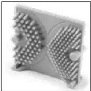 Close-up of a mechanical component with two side blades and textured surfaces (no visible text or symbols)