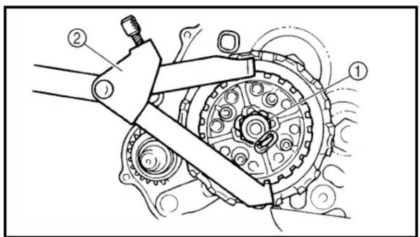 Technical diagram of a mechanical assembly with numbered components, likely illustrating a gear or cam mechanism.