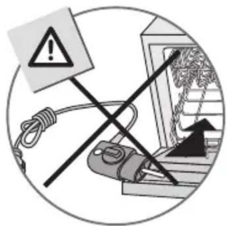 Warning symbol and warning sign depicting safety or hazard, with a warning sign and cable to a device.