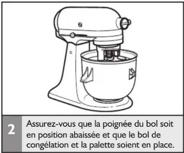 2 Assurez-vous que la poignée du bol soit en position abaissée et que le bol de congélation et la palette soient en place.