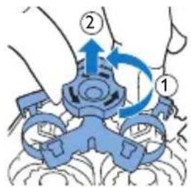 Diagram showing a mechanical device with labeled parts and directional arrows indicating motion or assembly.