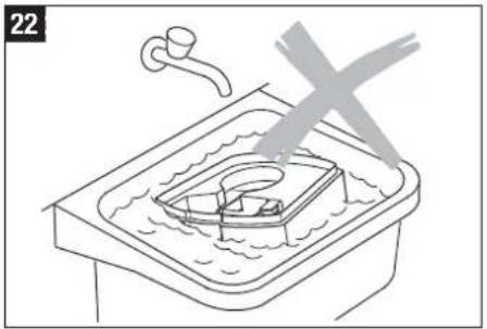 Line drawing of a kitchen sink with a drain and faucet, showing a showerhead and water level (no text or symbols)