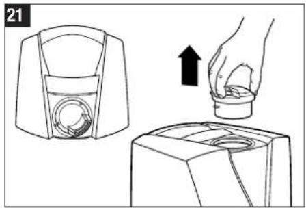 Illustration showing a hand inserting a small object into a device, with no text or symbols present.