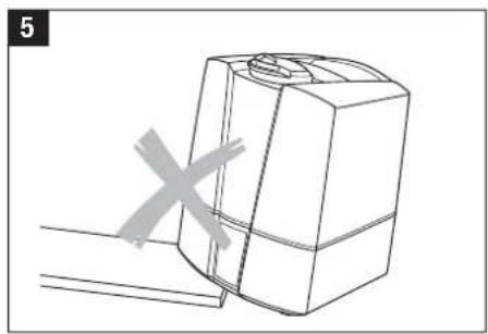 Line drawing of a mechanical component with a cross mark, no text or symbols present