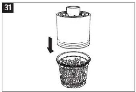 Diagram showing a container being inserted into a granular material, with no visible text or symbols.