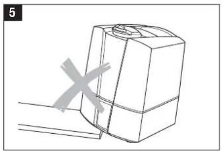 Line drawing of a 3D mechanical part with a cross mark and dimension lines, no text or symbols present