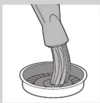 Illustration of a hand brushing a bowl with liquid, no text or symbols present.