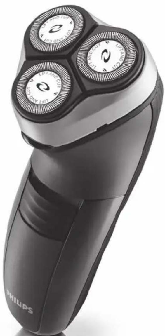 Close-up of a Philips electric shaver with three rotary dials (no visible text or symbols)