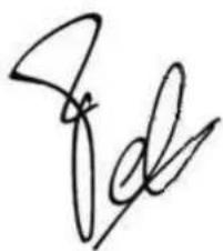 Handwritten signature or scribble on a document, possibly a signature or artistic mark