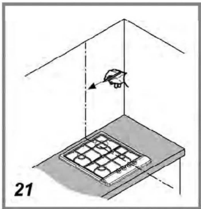 Diagram showing a hand holding a tool above a grid-patterned tray, with no visible text or symbols.