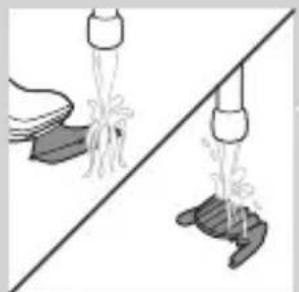 Illustration of two hands pouring liquid from a bottle onto a surface, separated by a diagonal line (no text or symbols)