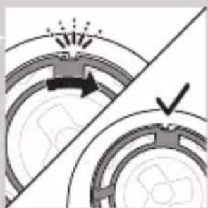 Diagram showing two circular components with arrows and a checkmark, no readable text or symbols present.