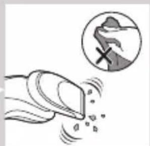 Illustration of a funnel-shaped object emitting particles, with an inset showing a hand holding a rock (no text or symbols)