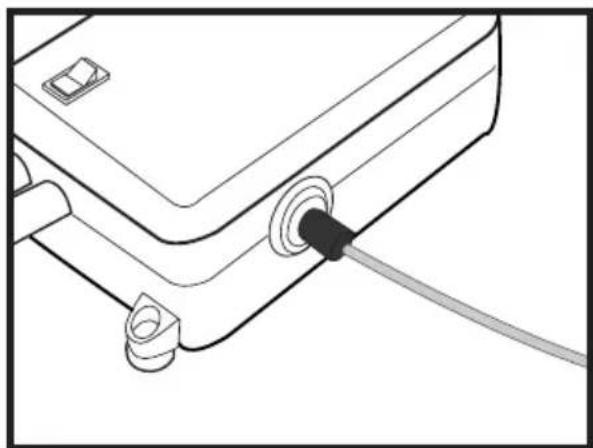 Line drawing of a mechanical device with a cable inserted into a housing (no text or symbols)