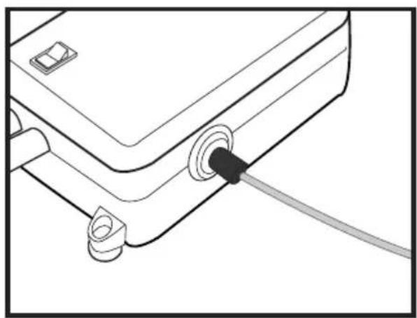Line drawing of a mechanical component with a black cable inserted into a housing (no text or symbols).