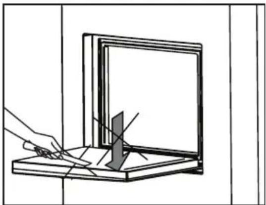 Line drawing of a hand using a tool to cut or mark a screen, with no visible text or symbols.