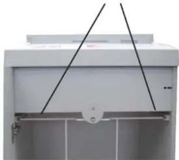 Exterior view of a white industrial machine with black diagonal lines indicating overhead components (no visible text or symbols)