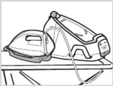 Line drawing of a pair of steam iron on a table (no text or symbols)
