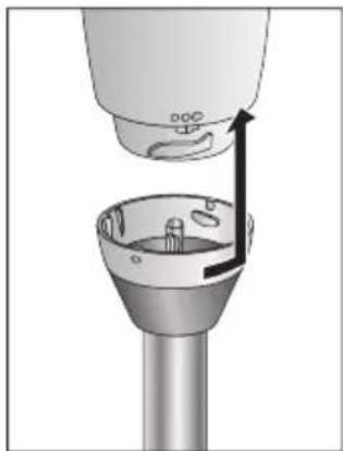 Diagram of a device with an arrow indicating motion or force, showing internal components and a cylindrical base (no text or symbols)