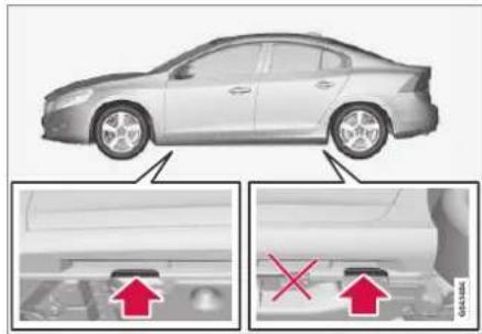 Diagram showing a car with two views: top view with red arrows indicating upward motion, bottom view with red X marks indicating failure or damage.
