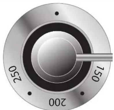 Close-up of a metallic circular dial with concentric rings and a central shaft (no text or symbols visible)