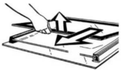 Illustration of a hand using a tool to cut or mark a mechanical component with arrows indicating motion (no text or symbols)