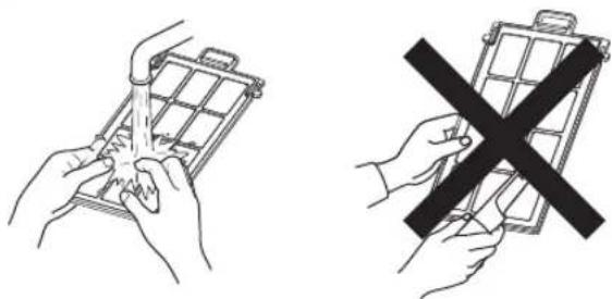 Two line drawings showing hands holding a grid device and a black X symbol (no text or symbols present).