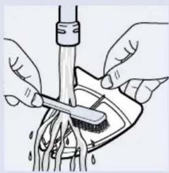 Illustration of hands using a tool to clean or rinse a surface with a brush (no text or symbols)