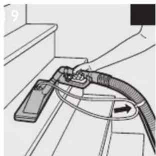 Diagram of a car interior showing a cable being inserted into a vehicle (no text or symbols present).
