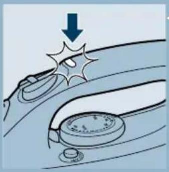 Illustration of a car wheel rim with a starburst effect and a downward arrow, no text or symbols present.