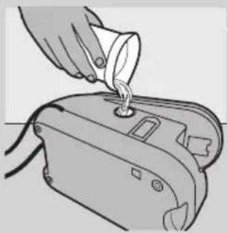 Illustration of a hand pouring liquid into a device.