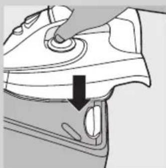 Diagram of a car interior showing a hand pressing down on the dashboard with a black arrow indicating direction (no text or symbols present)