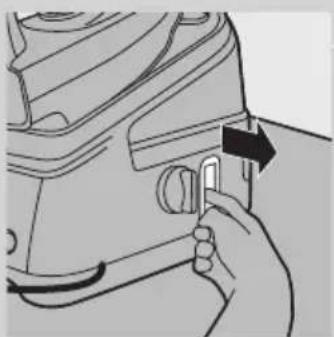 Illustration of a hand holding a small mechanical component with an arrow indicating direction (no text or symbols present)