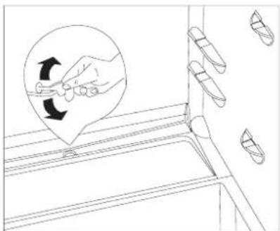 Diagram illustrating a hand using a tool to lift or rotate a component, with an inset showing the rotation direction.