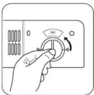 Hand holding a device with a rotary knob and scroll wheel.