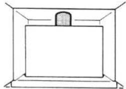 Simple line drawing of a rectangular box with a shaded top and base, enclosed in a larger frame. No text or symbols.