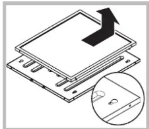 Diagram showing a layered electronic component with an arrow indicating upward motion, and a magnified inset showing a small circular detail (no text or symbols)