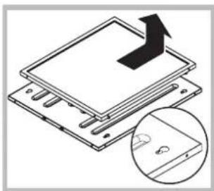 Diagram showing layered electronic components with an arrow indicating upward motion, and a magnified inset showing a small circular feature.